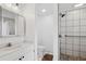 Bright bathroom with shower, white tiled walls, and modern fixtures at 102 Lake Ring Dr, Winter Haven, FL 33884