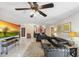 Spacious living room featuring tile floors and an open-concept design at 102 Lake Ring Dr, Winter Haven, FL 33884