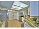 Bright kitchen featuring stainless appliances and granite countertops at 103 Lake Thomas Dr, Winter Haven, FL 33880