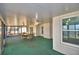 Inviting sunroom with lake views, ideal for enjoying meals and entertaining guests at 103 Lake Thomas Dr, Winter Haven, FL 33880