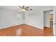 A bedroom with hardwood floors and a window at 1032 Tower Blvd, Lake Wales, FL 33853