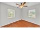 Bedroom with hardwood floors and a ceiling fan at 1032 Tower Blvd, Lake Wales, FL 33853