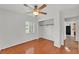 Bedroom features hardwood floors, a closet, and a ceiling fan at 1032 Tower Blvd, Lake Wales, FL 33853