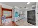 Open concept kitchen next to breakfast nook with white cabinetry and vintage turquoise oven at 1032 Tower Blvd, Lake Wales, FL 33853