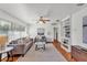 Well-lit living room with hardwood floors, neutral furniture, and a cozy atmosphere at 1032 Tower Blvd, Lake Wales, FL 33853