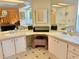 Bathroom with dual sinks and a vanity area with great lighting at 11 Navel Dr, Winter Haven, FL 33884