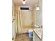 Full bathroom with a shower/tub combo and a single sink vanity at 11 Navel Dr, Winter Haven, FL 33884