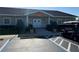 The community clubhouse with well-kept landscaping, parking and golf cart parking at 11 Navel Dr, Winter Haven, FL 33884