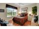 Cozy bedroom with a large window, comfortable bed, and ample natural light at 1162 E Highland Dr, Lakeland, FL 33813