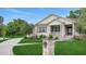 Beautiful home exterior showcasing a manicured lawn, a mailbox, and a paved walkway at 1162 E Highland Dr, Lakeland, FL 33813