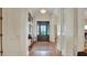 Grand entryway with hardwood floors, a console table, and elegant decor at 1162 E Highland Dr, Lakeland, FL 33813