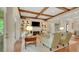 Cozy living room with a fireplace, built-in bookshelves, and comfortable seating at 1162 E Highland Dr, Lakeland, FL 33813