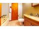Bathroom featuring a tiled floor, a vanity with sink, a toilet, and a shower-tub combo at 1432 Libby Rd, Babson Park, FL 33827