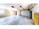 Large garage with side windows, featuring potential for ample storage and organization at 1432 Libby Rd, Babson Park, FL 33827