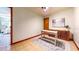 Bright office space with desk, custom cabinet, and bright painting and tile floors at 1432 Libby Rd, Babson Park, FL 33827