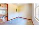 Small room with concrete floors, a small window, and access to another room at 1432 Libby Rd, Babson Park, FL 33827