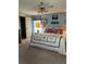Charming bedroom with nautical decor, comfortable bed, and ample natural light at 148 Sweet Cir, Winter Haven, FL 33884