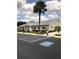 Attractive one-story building with a well maintained lawn and landscaping, along with a convenient parking area at 148 Sweet Cir, Winter Haven, FL 33884
