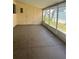 Spacious outdoor patio with ample room for seating, offering a blank slate for creating an outdoor retreat at 148 Sweet Cir, Winter Haven, FL 33884