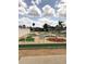 Fun putting green for residents to enjoy a leisurely game with friends and neighbors at 148 Sweet Cir, Winter Haven, FL 33884