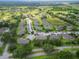 Expansive condo community featuring well-maintained landscaping, a scenic lake, and abundant parking at 1503 Eagle Pond Dr # 1503, Winter Haven, FL 33884