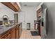 Well-lit kitchen features stainless steel appliances and granite countertops at 1503 Eagle Pond Dr # 1503, Winter Haven, FL 33884