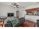 Cozy living room featuring hardwood floors and seamless kitchen access at 1503 Eagle Pond Dr # 1503, Winter Haven, FL 33884