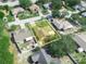 An aerial view of a cozy property and well-maintained backyard at 1506 Chamberlain Loop, Lake Wales, FL 33853