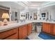 Bright bathroom featuring an extended vanity with dual sinks and ample storage at 1506 Chamberlain Loop, Lake Wales, FL 33853