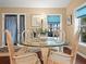 Breakfast nook featuring a glass table and white chairs at 1506 Chamberlain Loop, Lake Wales, FL 33853