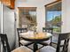 Kitchen nook with table and chairs by the bright windows at 1506 Chamberlain Loop, Lake Wales, FL 33853