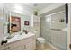 Bathroom with a glass enclosed shower, single sink vanity, and medicine cabinet at 1531 Oakview Se Cir, Winter Haven, FL 33880