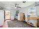 Garage with laundry appliances, storage, a work bench, and access to the home at 1531 Oakview Se Cir, Winter Haven, FL 33880