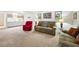 Bright living room with comfortable seating and a view of the kitchen at 1531 Oakview Se Cir, Winter Haven, FL 33880