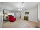 Spacious living room with ample seating and a dining area at 1531 Oakview Se Cir, Winter Haven, FL 33880
