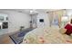 Cozy main bedroom with hardwood floors, a ceiling fan, and neutral tones at 1531 Oakview Se Cir, Winter Haven, FL 33880