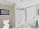 Bathroom featuring a shower and toilet, plus a convenient door to the other rooms at 1534 Longbow Dr, Lakeland, FL 33810