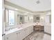 Bright bathroom featuring ample counter space, a vanity area, and natural light at 1534 Longbow Dr, Lakeland, FL 33810