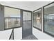 Enclosed entrance with windows and blinds for privacy and lots of natural light inside this lovely home at 1534 Longbow Dr, Lakeland, FL 33810