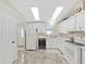 Bright kitchen featuring lots of cabinets and modern appliances at 1534 Longbow Dr, Lakeland, FL 33810