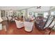 Spacious open-concept living and dining area with hardwood floors and comfortable furniture at 1534 Longbow Dr, Lakeland, FL 33810