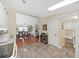 Open floor plan from kitchen to dining at 1534 Longbow Dr, Lakeland, FL 33810