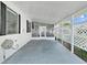Spacious covered patio with comfortable seating and a view of the surrounding neighborhood at 1534 Longbow Dr, Lakeland, FL 33810