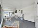Inviting covered porch features ample seating and a welcoming entrance at 1534 Longbow Dr, Lakeland, FL 33810