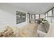 Bright sunroom with large windows and tiled floors perfect for relaxation at 1534 Longbow Dr, Lakeland, FL 33810