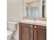 Bathroom featuring a toilet, vanity and mirror at 1602 Eagle Pond Dr # 1602, Winter Haven, FL 33884