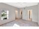 Spacious bedroom with carpet floors, ceiling fan and walk-in closets at 1602 Eagle Pond Dr # 1602, Winter Haven, FL 33884