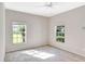 Bright bedroom with windows providing natural light and pleasant views at 1602 Eagle Pond Dr # 1602, Winter Haven, FL 33884