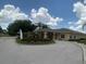 Front of community clubhouse and landscaping at 1602 Eagle Pond Dr # 1602, Winter Haven, FL 33884