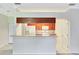 Open kitchen design featuring a breakfast bar and bright lighting at 1602 Eagle Pond Dr # 1602, Winter Haven, FL 33884